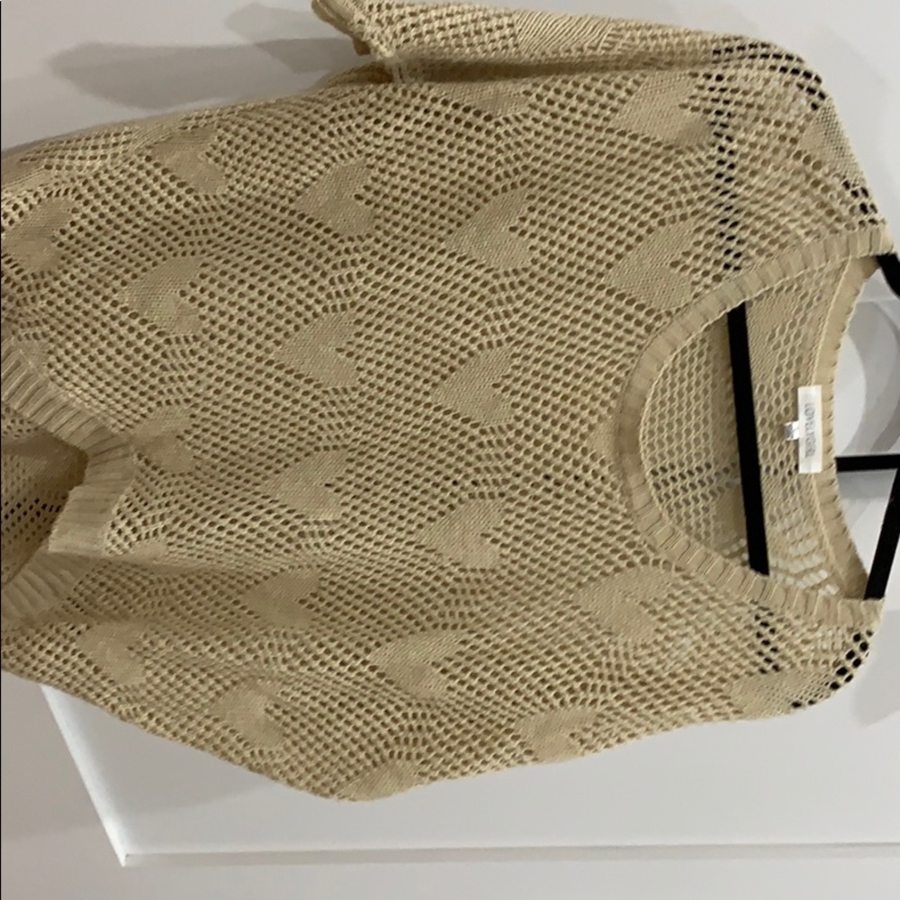 Lovely girl beige sweater with hearts